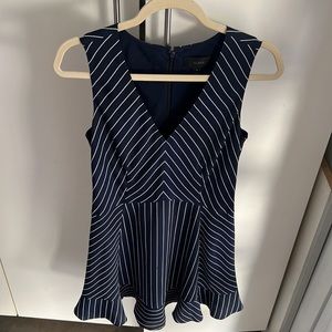 J crew navy white stripe dress. V neck ruffle bottom knee length dress.